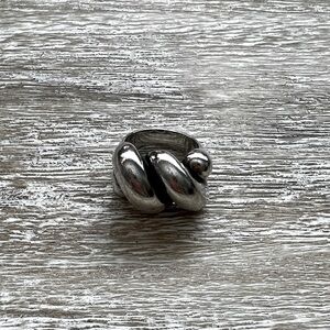 James Avery Sisterhood ring, size 6. .925 silver. Normal wear and tear.